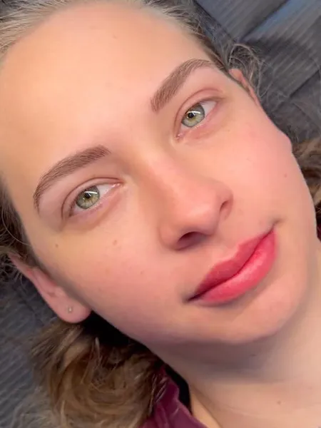 Client with nano brows and lip blush